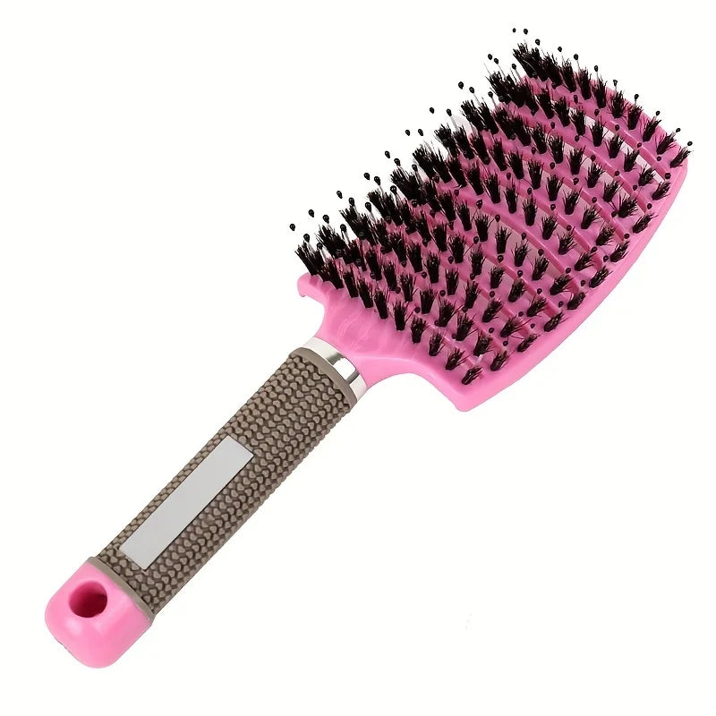 Hairbrush with pink handle and bristles on a white background