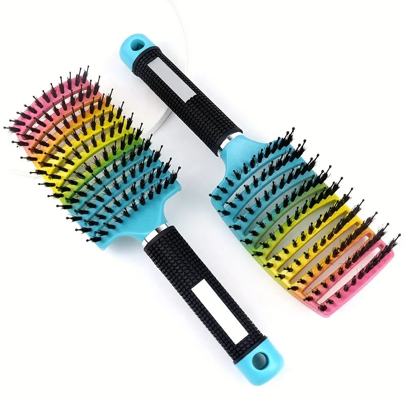 Two colorful pet grooming brushes with rainbow bristle patterns on a white background.