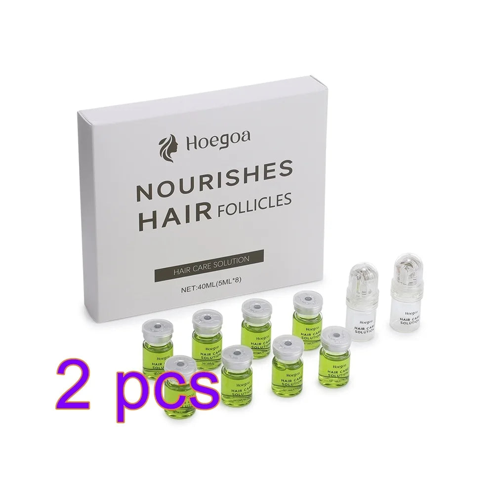 Hoegoa hair care solution packaging with multiple vials on a white background