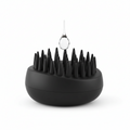 Black hair dryer diffuser with a hanging white hair tie on a white background